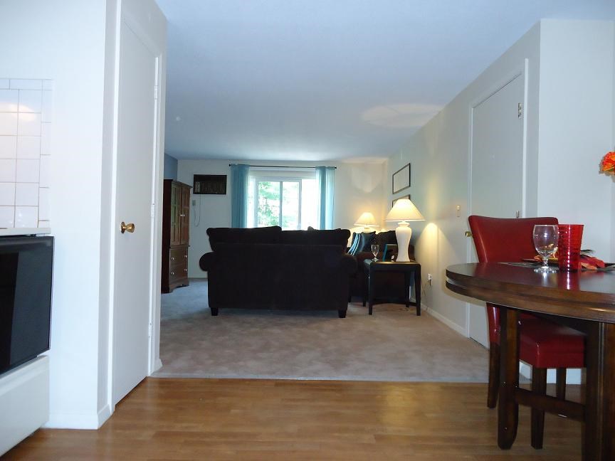 a living room with a couch and a table