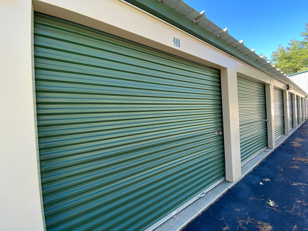 A series of storage units with the number 410 on the doors.