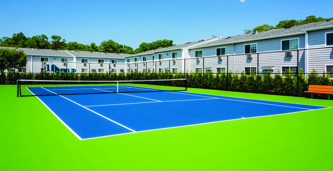 outdoor tennis court green and blue professional at Southwood Luxury Apartments, North Amityville, NY, 11701