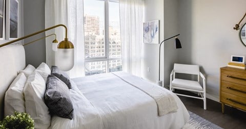cozy bedroom with perfect decor at Tower 28, Long Island City