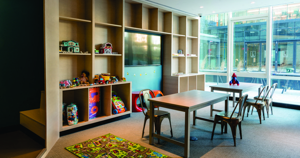children's playroom with toys at Tower 28, Long Island City, NY