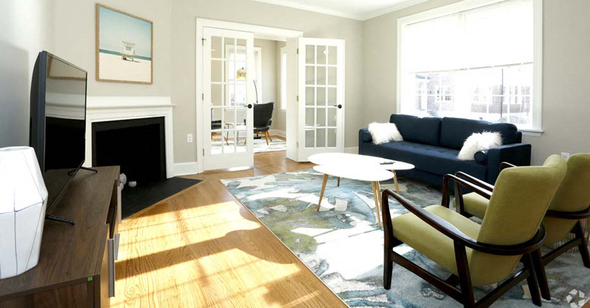 a living room with a couch and a table