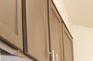 Renton Apartments for Rent-Modern Kitchen With Sleek Black Appliances and Espresso Colored Cabinets