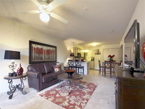 a living room with a couch and a table