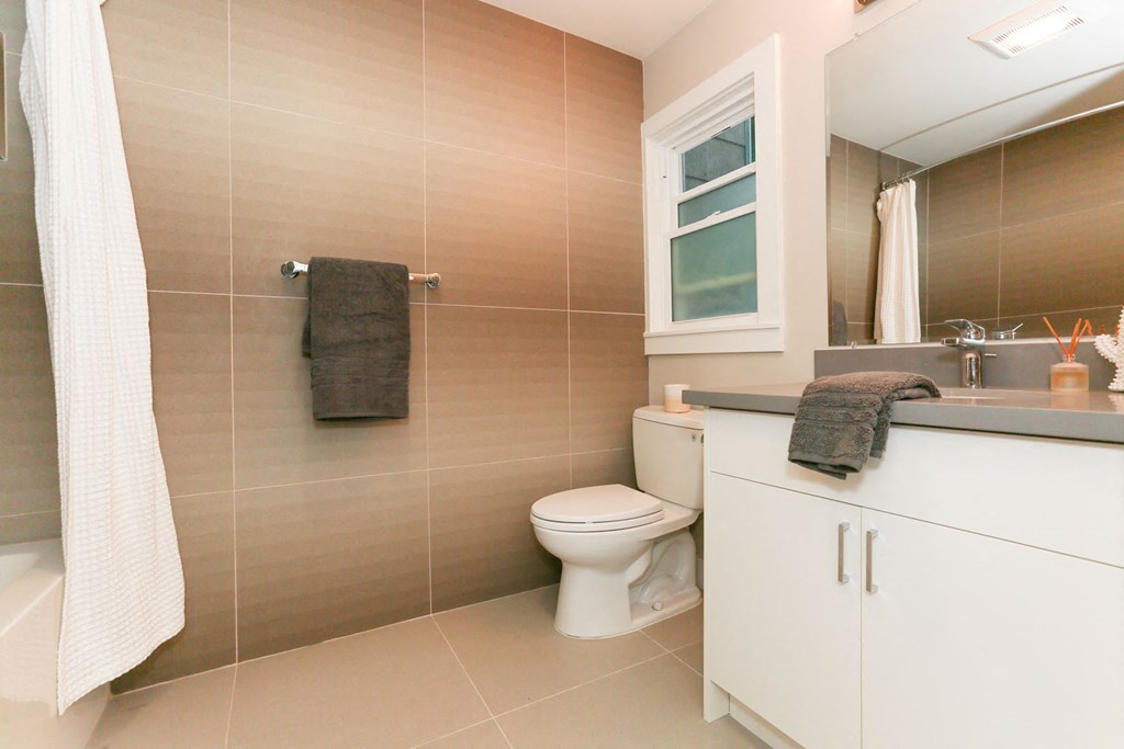 a bathroom with a toilet and a sink