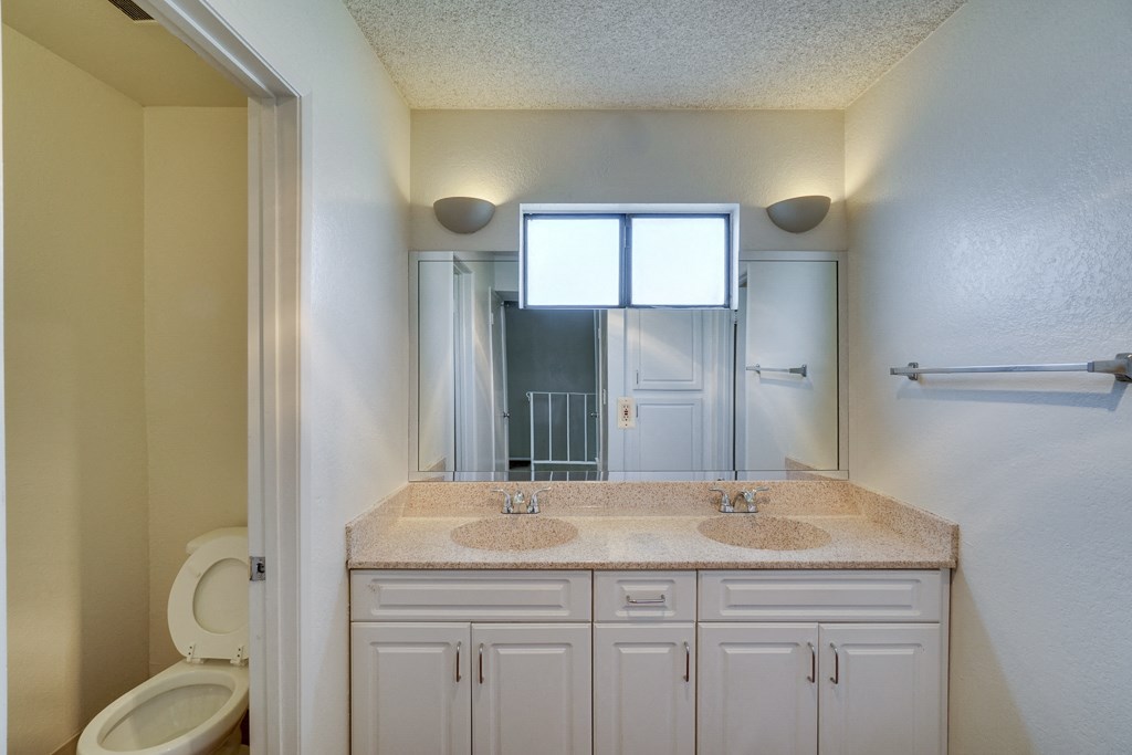 Renovated Bathrooms With Quartz Counters at Highlander Park Apts, California, 92507