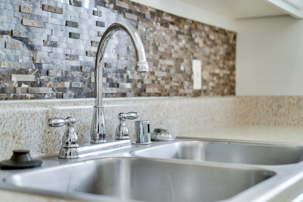 Stainless Steel Sink With Faucet at Highlander Park Apts, Riverside