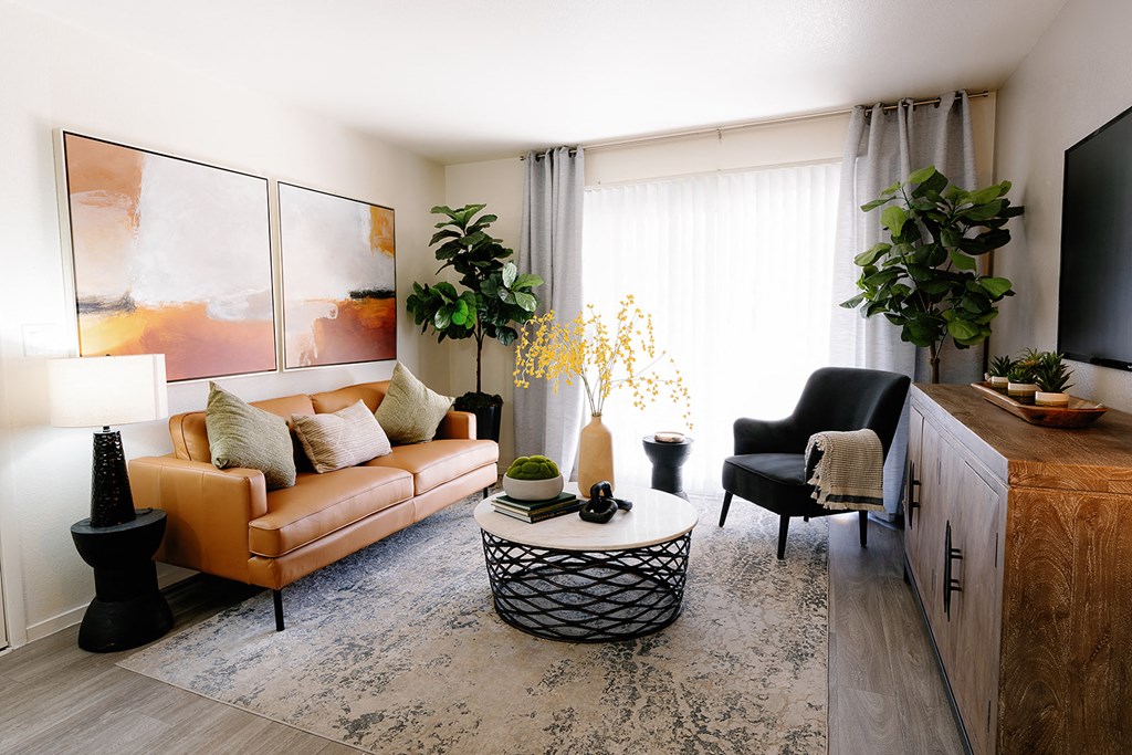 a living room with a couch and a table