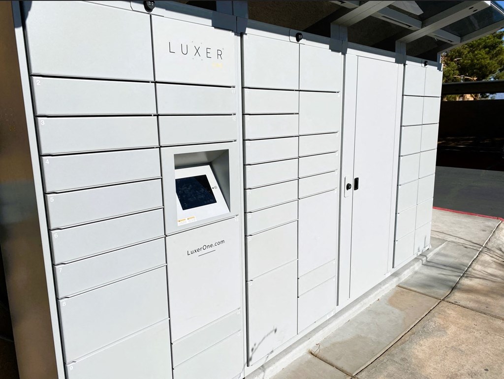 the lockers are white with a small window in the door