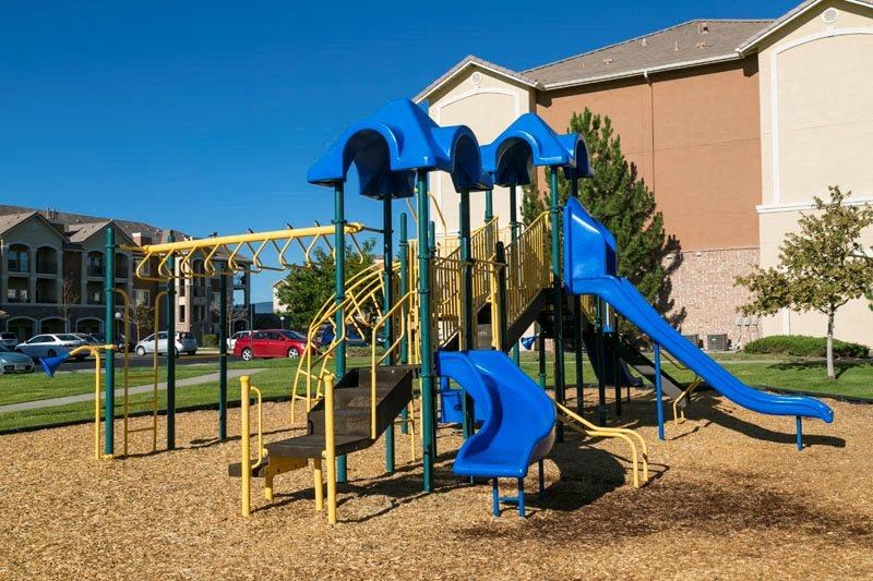 a playground in front of a building