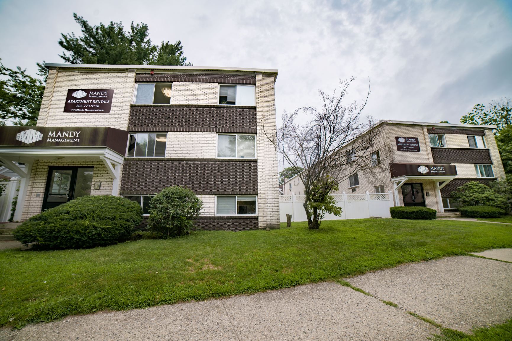 The image shows a building with the name "Mandy" on it.