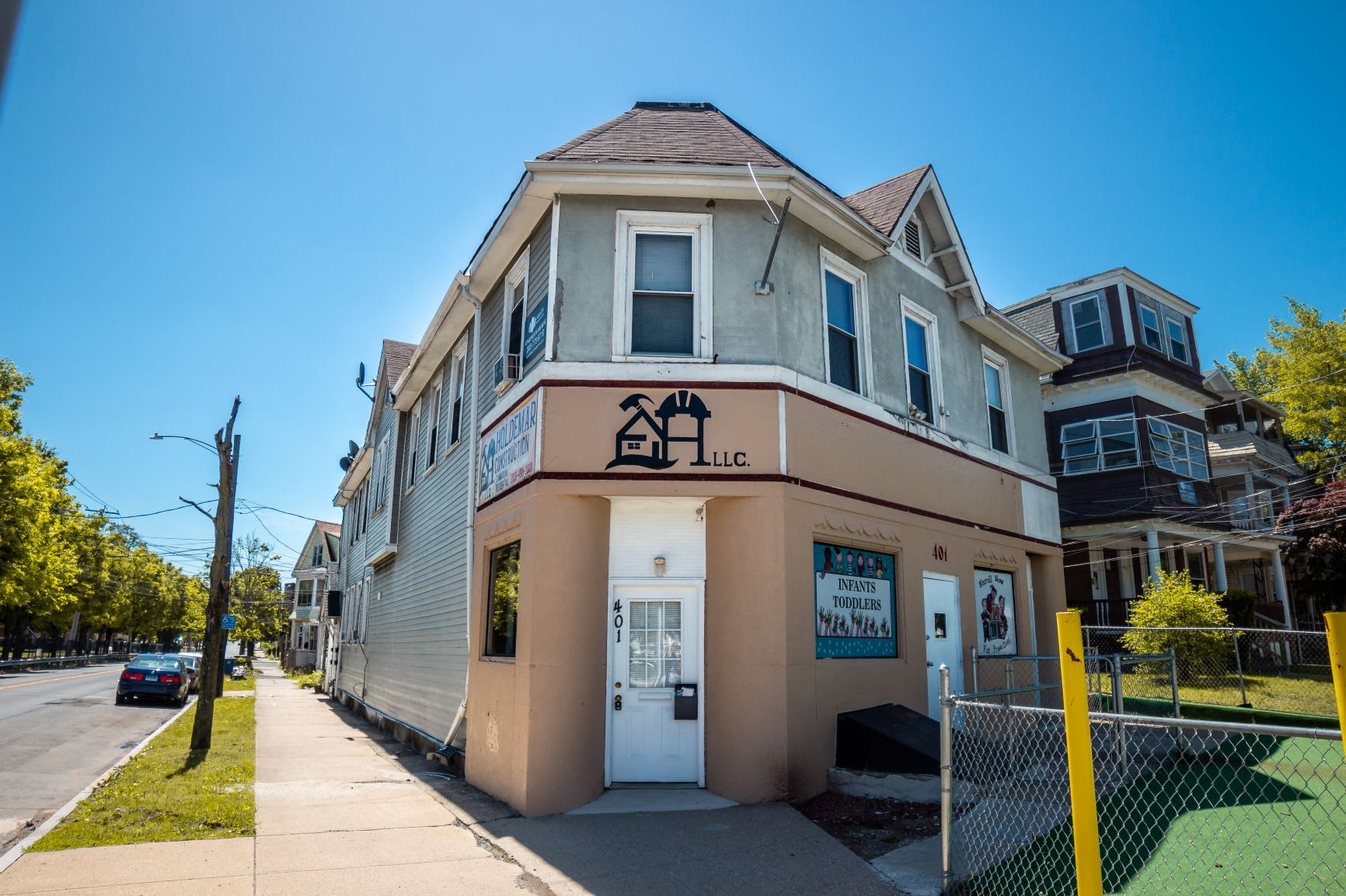A building with a sign that says "LLC" on it.