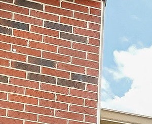 the front of an apartment building with a handicapped accessible entrance