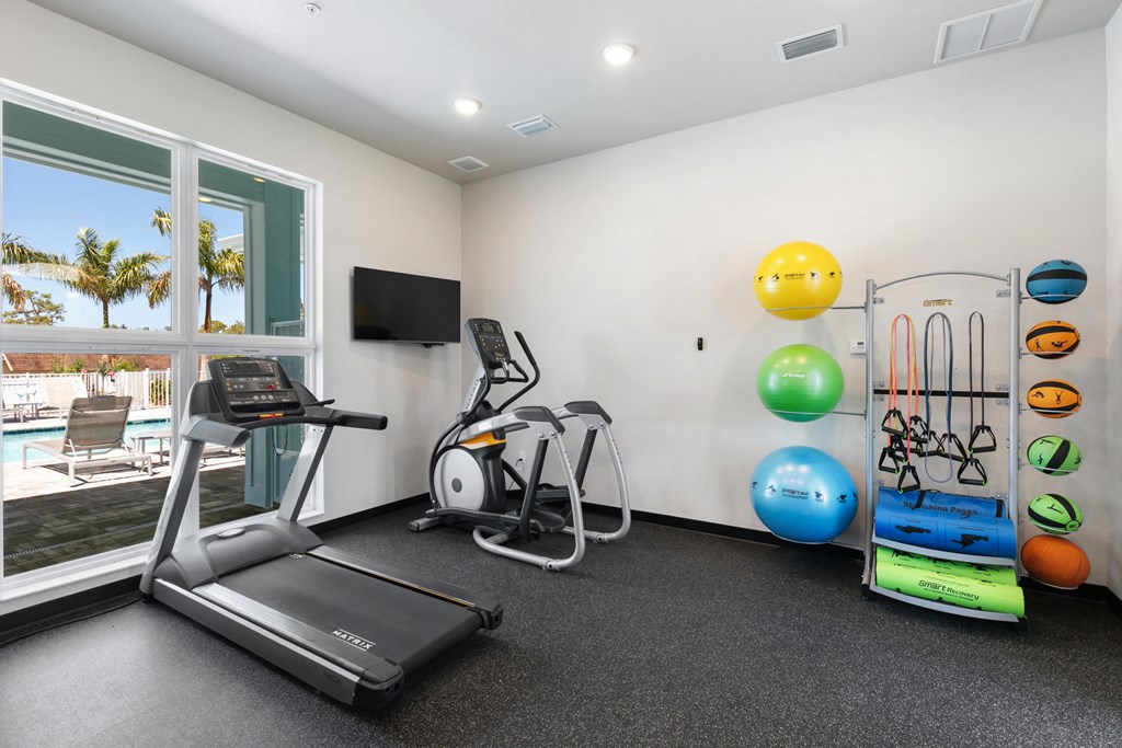 the gym with treadmills and weights at the preserve at greatstone