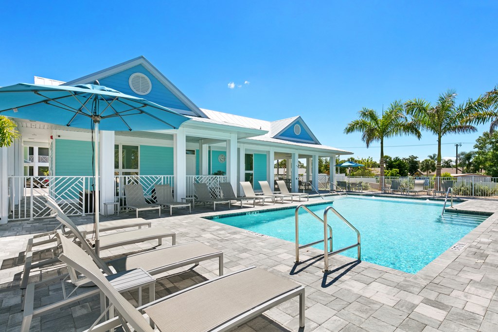 the pool area at the resort at longboat key club
