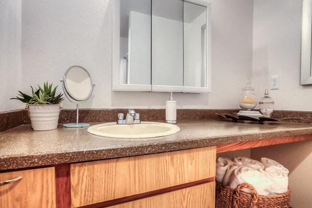Renovated Bathrooms With Quartz Counters at Woodcreek Apartments, Fairview, OR