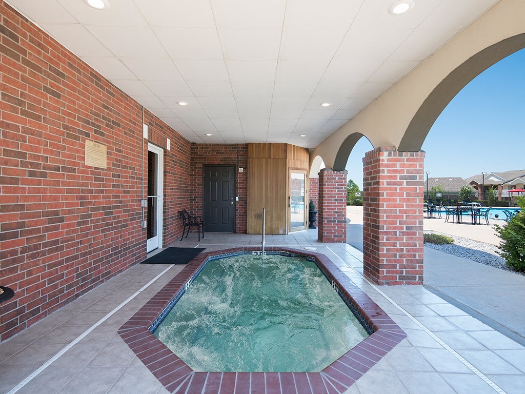 the indoor jacuzzi is in the center of the lobby of the building