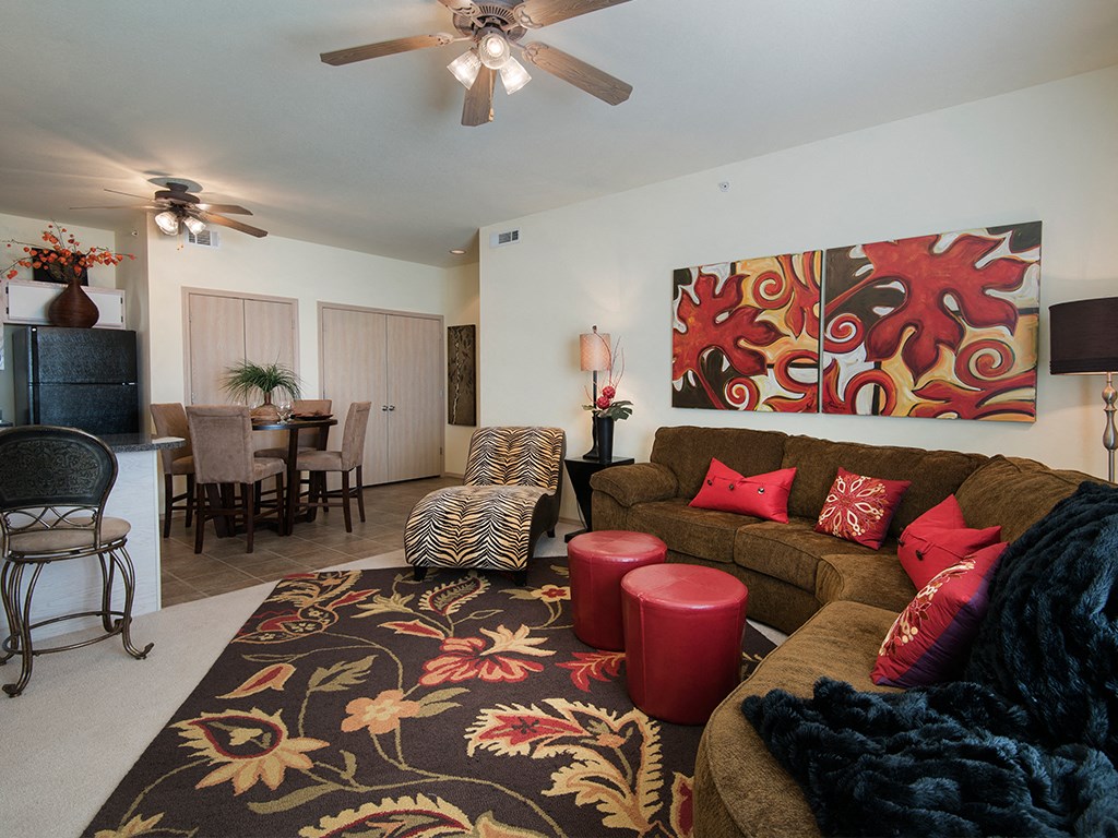 a living room with a couch and a rug