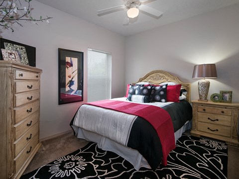 upgraded bedroom at the district at highland village apartments co