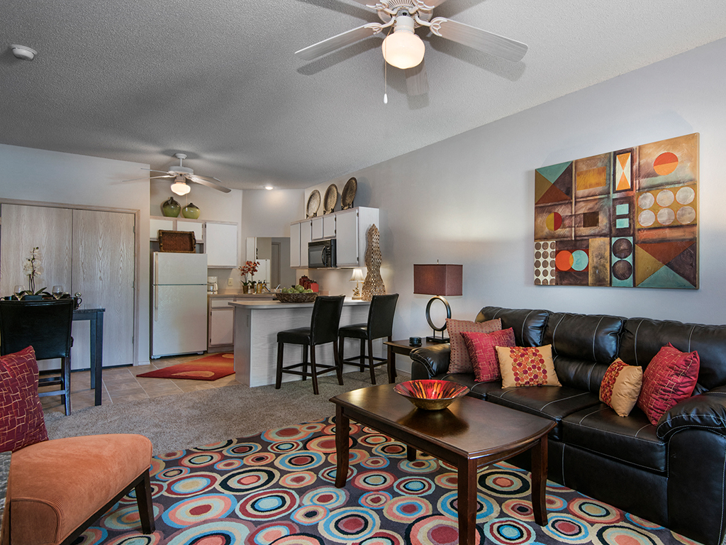 a living room with a couch and a table
