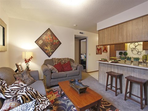 a living room with a couch and a table