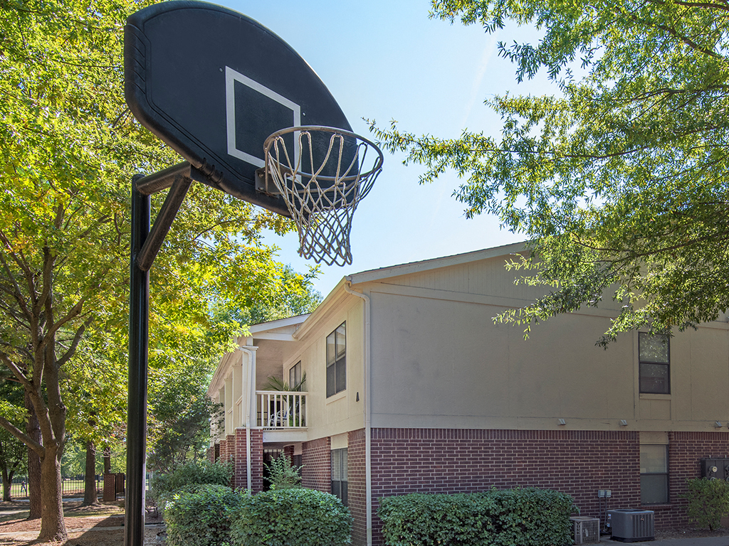a basketball hoop in front of a building