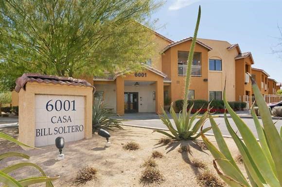 a building with a sign in front of it