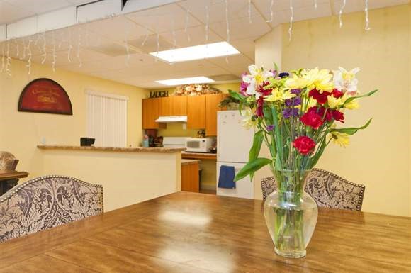 a table with a vase of flowers on it