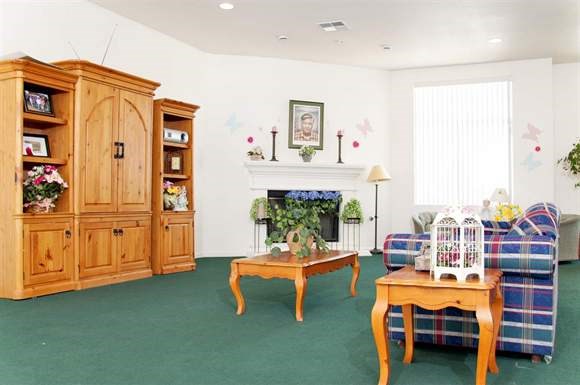 a living room with a couch and a table