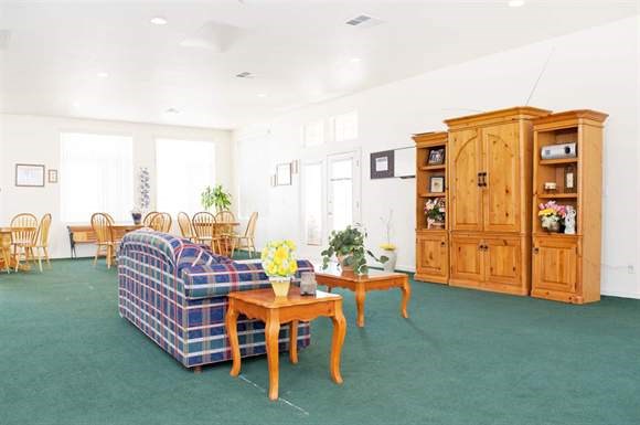 a living room with a couch and a table