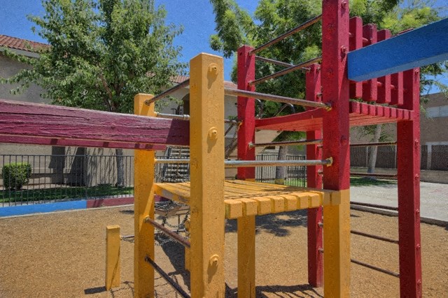 the playground at our apartments is equipped with slides and swings