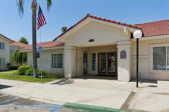 a building with an flag in front of it