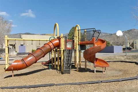 a playground with a slide and a
