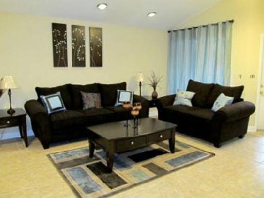 a living room with couches and a coffee table