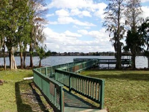 a park with benches overlooking a body of water