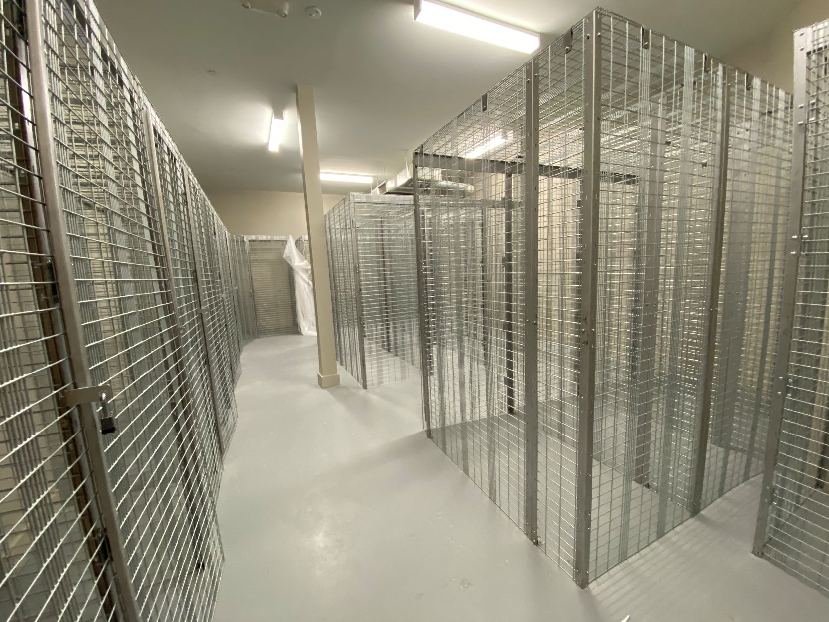 A room with large floor-to-ceiling storage lockers for residents at The Flats at Tioga Town Center.