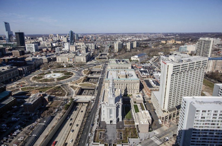 a view of the city from the top of a skyscraper