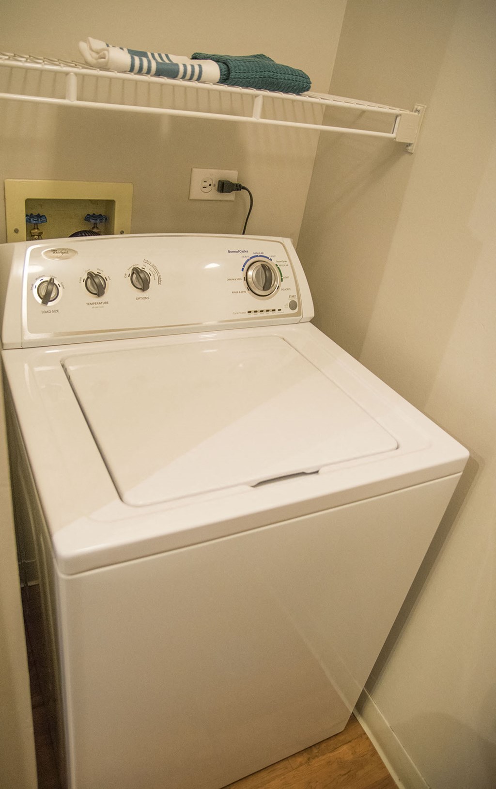 a white washer and dryer in a room