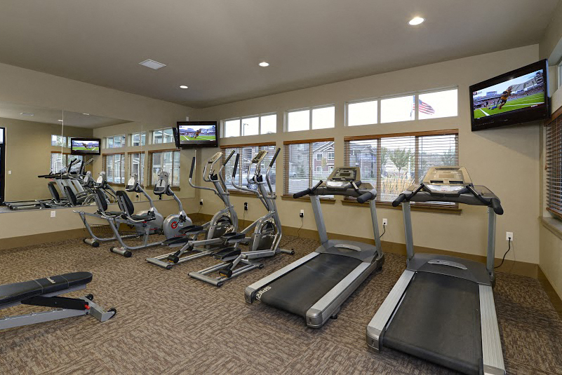 Gym with cardio equipment  and TV Colorado Springs, CO 80908 | Copper Range Apartment Rentals