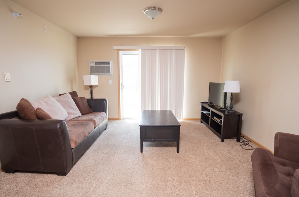 a living room with a couch and a table