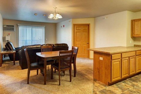 a living room with a table and a couch