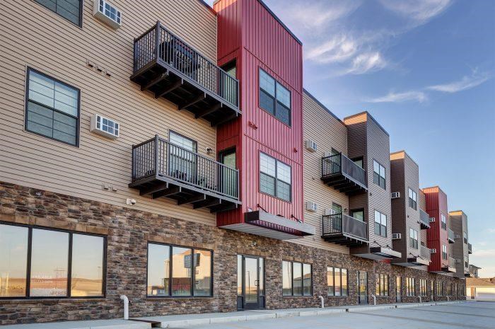a building with three balconies on the side of it