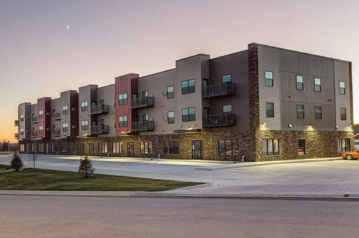 a building with a lot of windows and a street