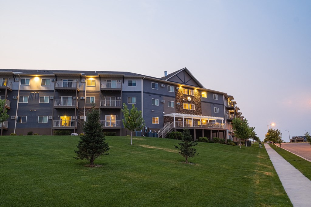 exterior view of the residence inn at dusk