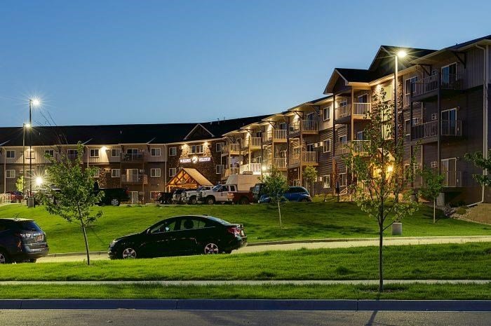 Night Exterior View of Bluffs of Williston Apartments ND