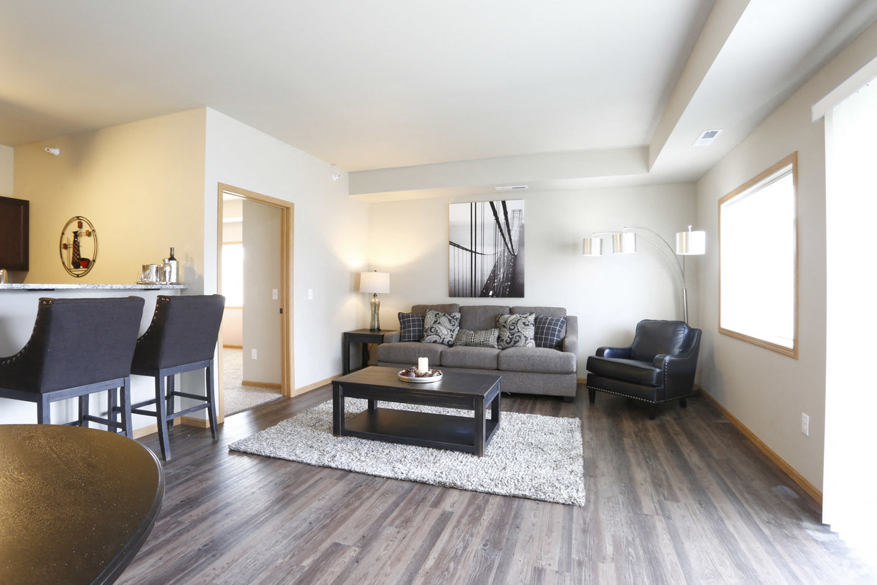 a living room with a couch and a table