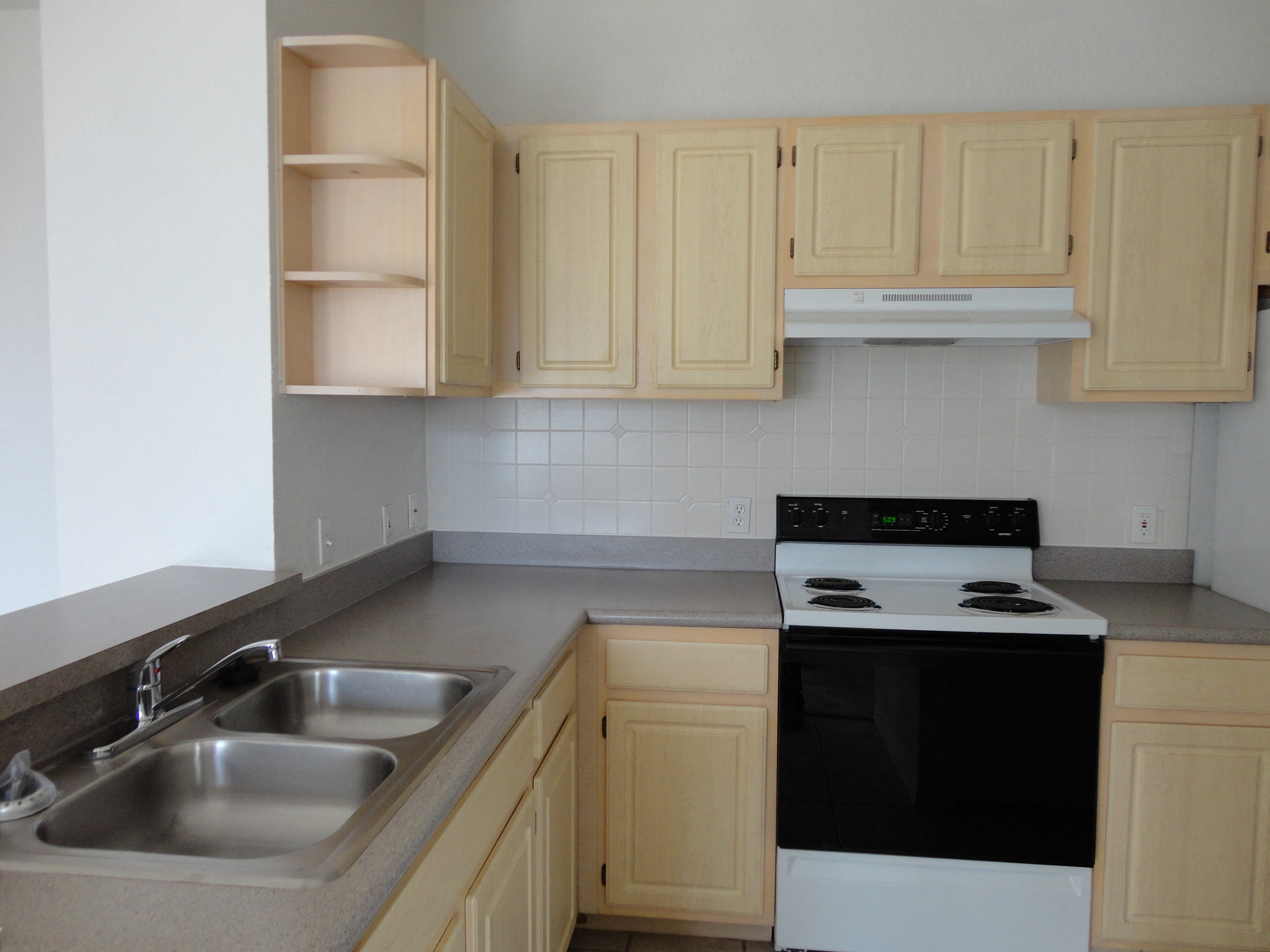 Interior Unit Kitchen Sink Counter Cabinets Stove Allegro Palms Riverview Florida