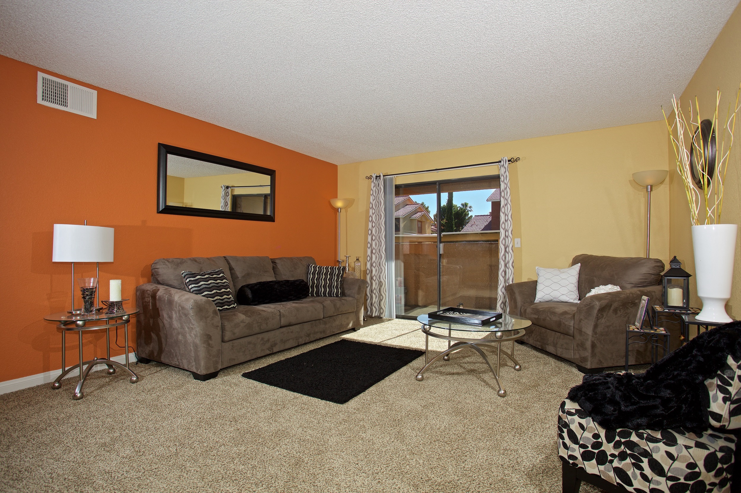 a living room with two couches and a table