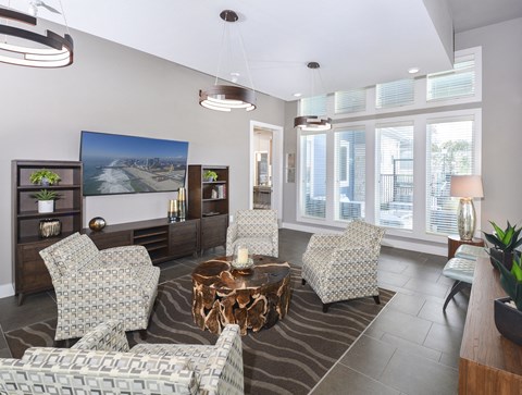 A living room with a zebra print rug and a coffee table.