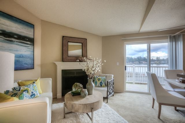 Living Room With Fireplace at Waterford Apartments, Washington, 98208 - Photo Gallery 1